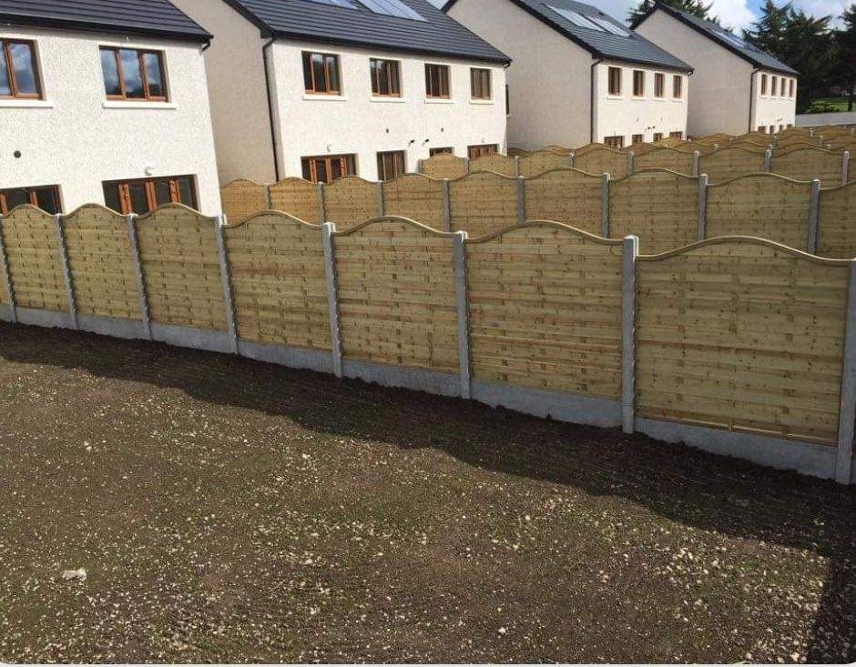 Timber panel fencing with concrete posts